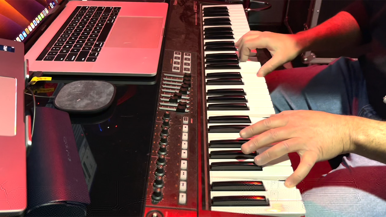 Andrew Doss recording keyboards in the home studio